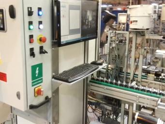 Laser lettering of spark plug cases Laser lettering of spark plug cases