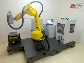 Mobile Laserhärtungsarbeitsstelle. Robotisches Laserhärten. Roboter und Positionierer FANUC. Mobile Laserhärtungsarbeitsstelle. Robotisches Laserhärten. Roboter und Positionierer FANUC.