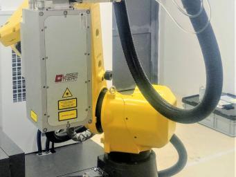 Mobile Laserhärtungsarbeitsstelle. Robotisches Laserhärten. Roboter und Positionierer FANUC. Mobile Laserhärtungsarbeitsstelle. Robotisches Laserhärten. Roboter und Positionierer FANUC.